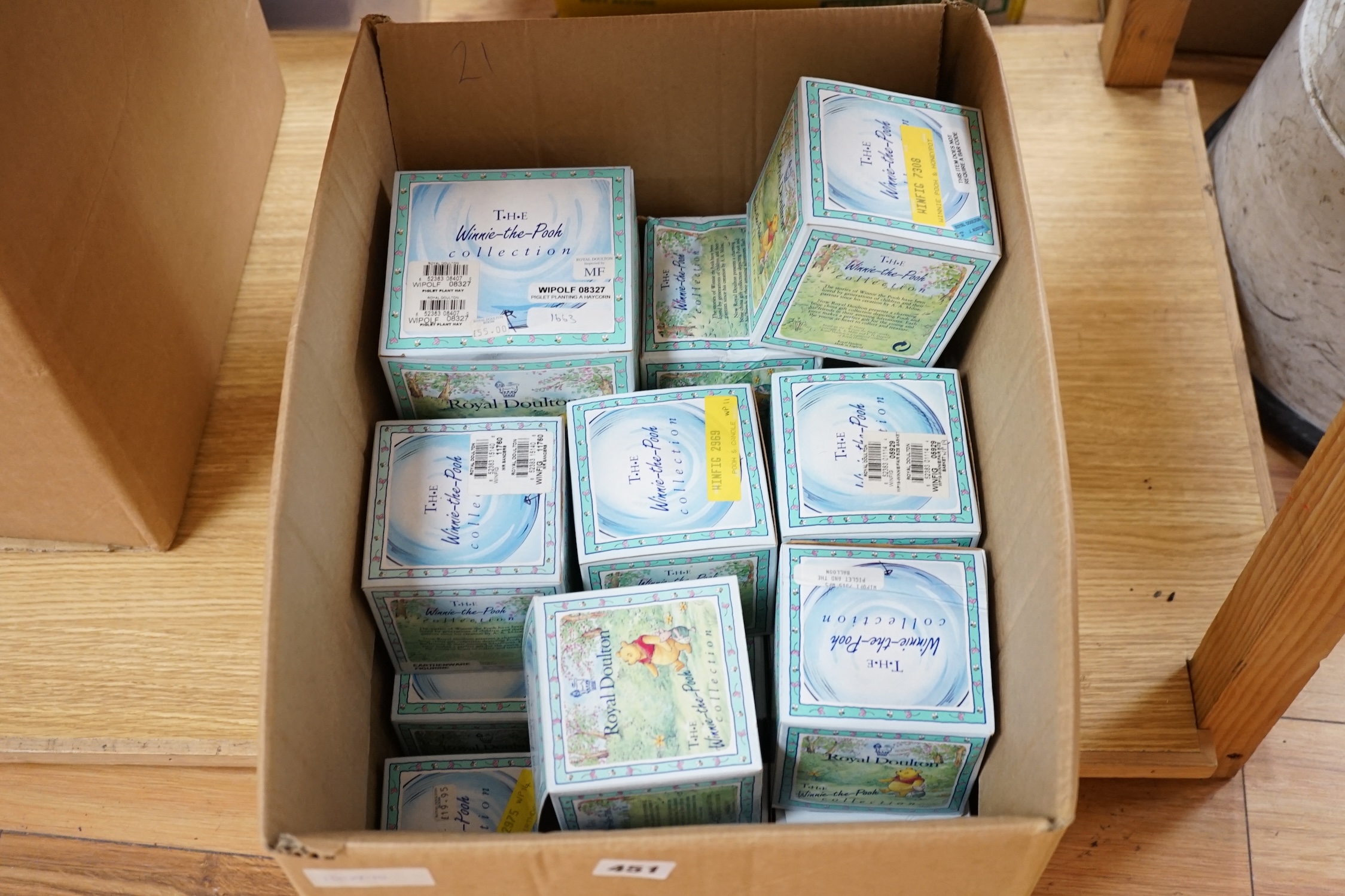 Twenty one various Royal Doulton ‘The Winnie the Pooh Collection’ figures to include ‘Piglet Planting A Haycorn’, ‘Eeyores Birthday’ etc., all boxed. Condition - fair to good